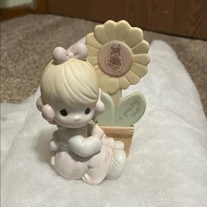 Precious Moments Blonde Figurine with Cream Flower